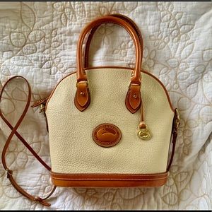 Dooney Bourke cream leather satchel shoulder bag.